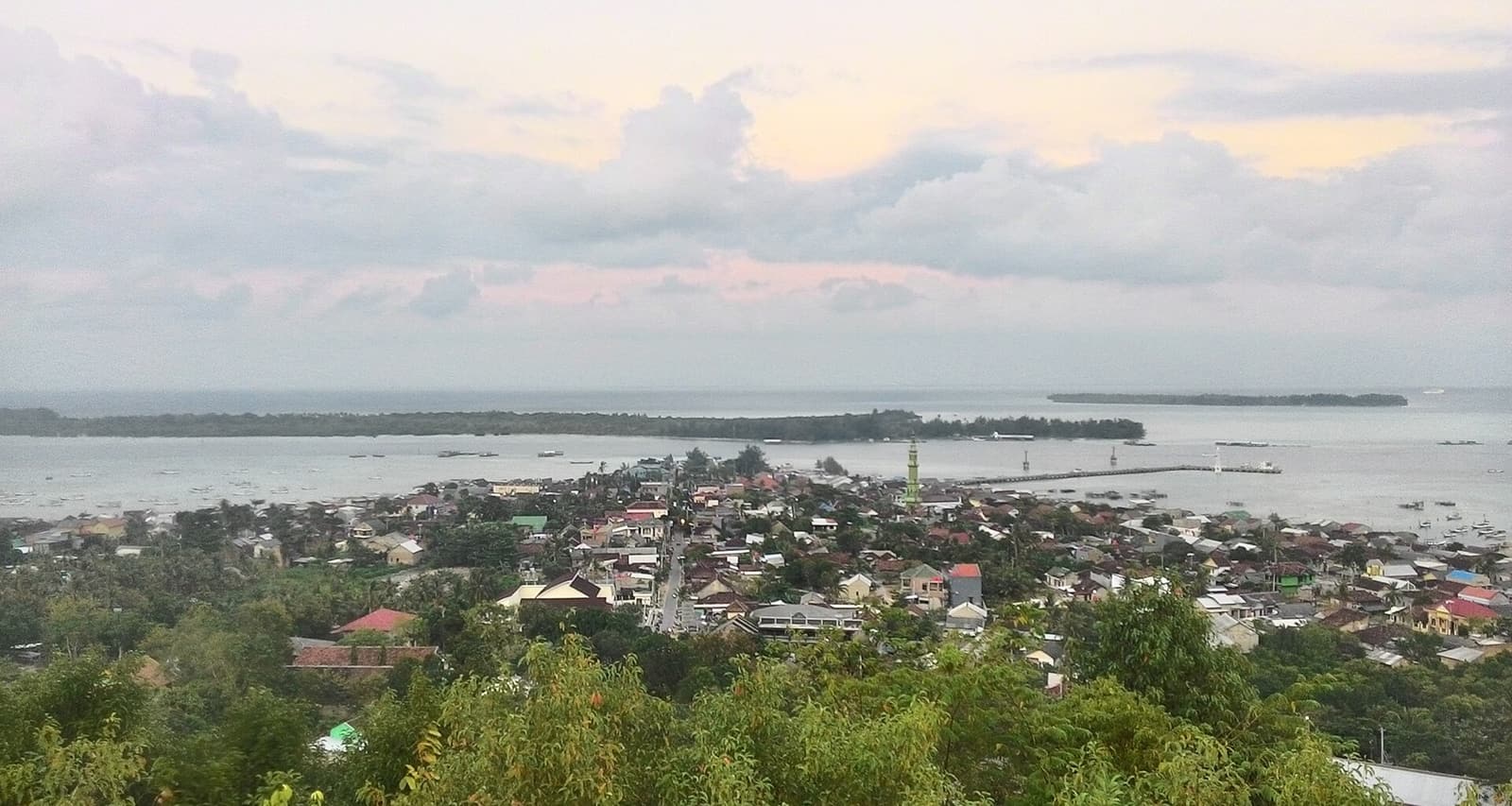 Karimunjawa town and its harbour seen from a hill in the morning