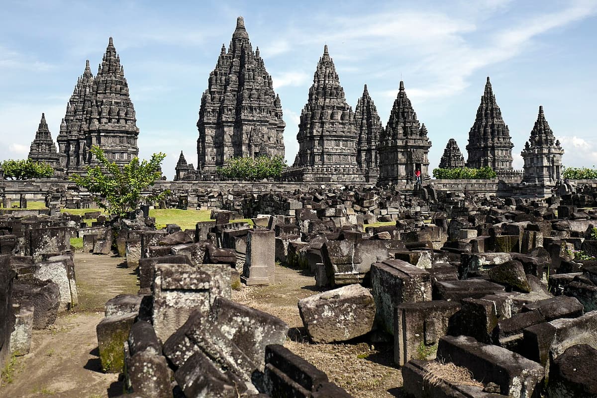 The towers of Prambanan temple against a blue sky